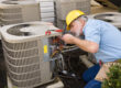 man fixing AC Residential air conditioning venice fl