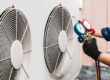 Commercial HVAC Service Plan HVAC tech repairing commercial HVAC unit