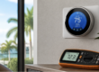 Clean, realistic close-up of a home thermostat showing 72% indoor humidity with HVAC diagnostic tools nearby, bright natural light, and a subtle Southwest Florida coastal view through the window for ac repair venice fl.